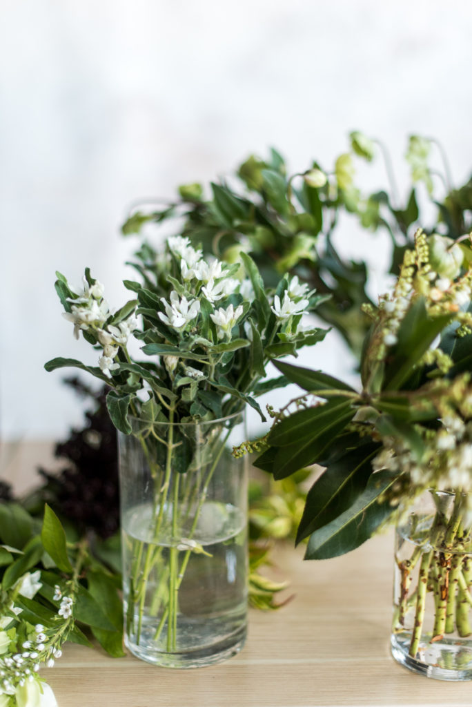 Image of some flowers resting in a cup of water