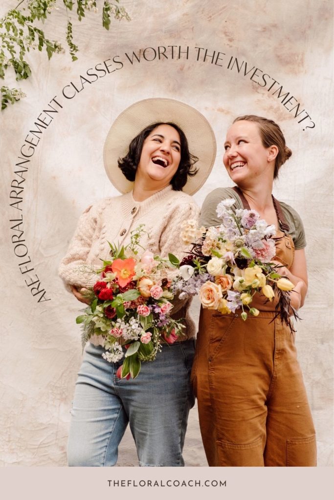Amy Balsters from The Floral Coach laughs along with her fellow florist while holding up their work; image overlaid with text that reads Are Floral Arrangement Classes Worth the Investment?