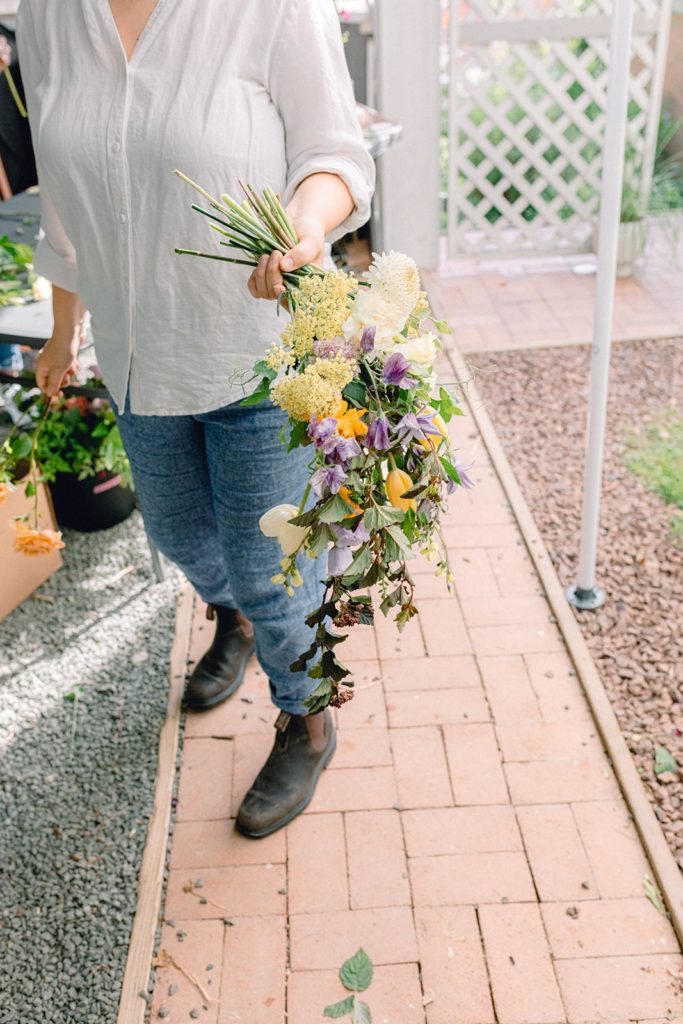 Here's a picture of Amy Balsters holding a bouquet in process