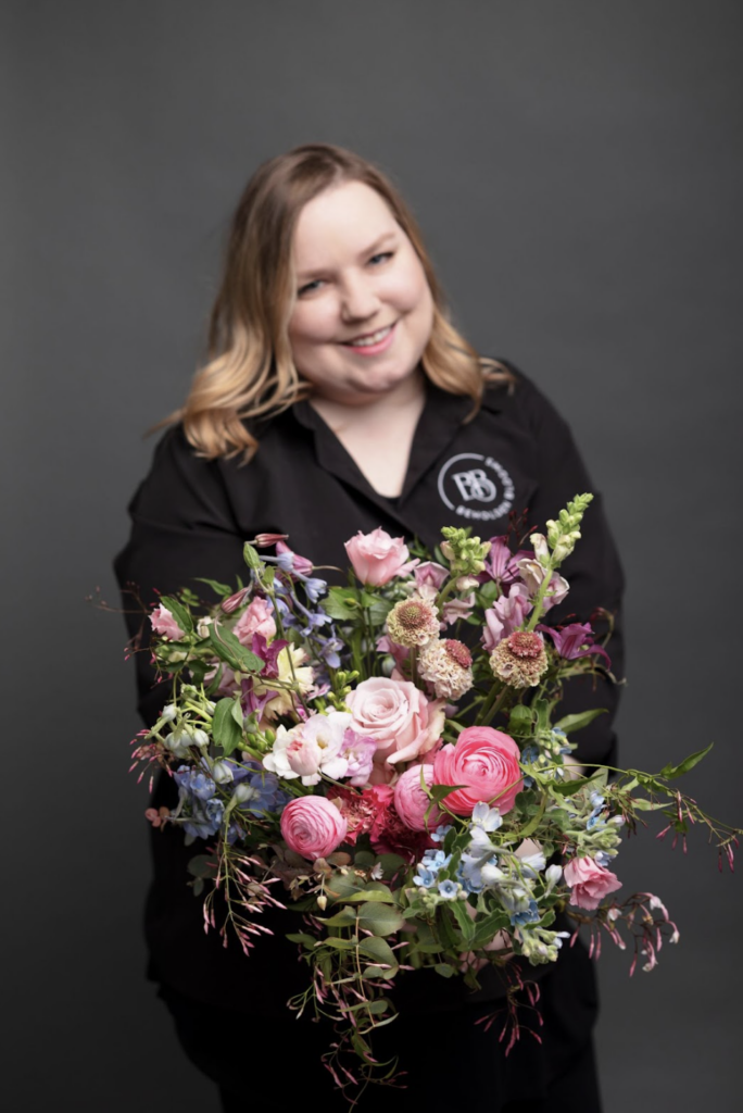 Nicole Gilbride of Beholden Blooms shows off her latest bouquet during The Mayesh Design Tour with The Floral Coach®