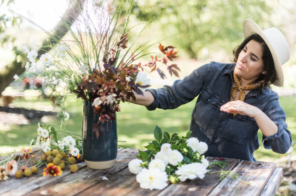 Amy Balsters, The Floral Coach® working with grasses as she builds a bouquet from her yard